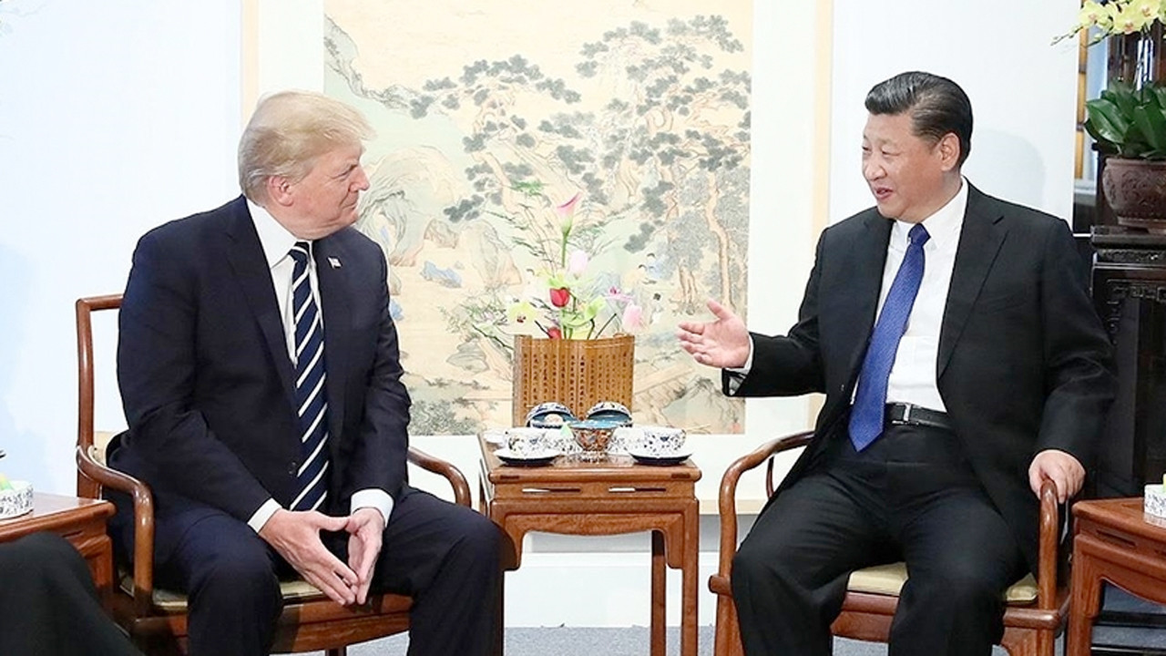 ABD ve Çin liderleri, Güney Kore'nin Busan şehrinde bir araya geldi baltalar kuma gömüldü