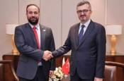 Burhanettin Duran, Suriye enformasyon bakanı ile görüştü