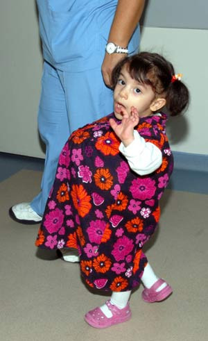 İkizini karnında taşıyor - Resim: 4