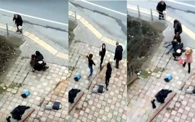 Çizmesini çıkardığı gibi saçına daldı! Kızların saç saça sokak kavgası!