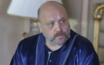 Ahmet Mümtaz Taylan sezonun yorgunluğunu şezlongda çıkardı