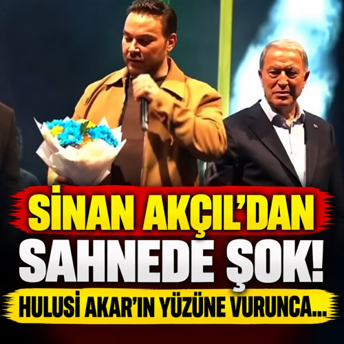 Sinan Akçıl sahnede yaptı yapacağını! Hulusi Akar'ın yüzüne vurdu