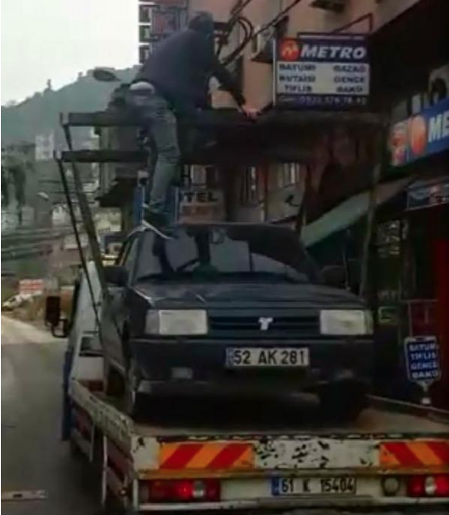 Çekicinin üstünde 3 kilometre yol gitti görenler şaşkına döndü - Resim: 2