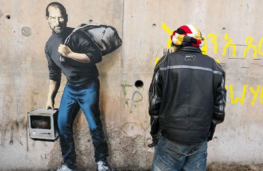 Banksy Apple'ın kurucusunu mülteci olarak çizdi