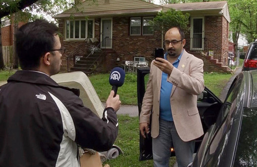  FETÖ firarisi Emre Uslu Virginia'da görüntülendi AA muhabirini tehdit etti