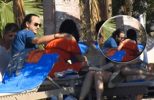 Plajda aşka geldi Deniz Çakır'ı öpücüklere boğdu!