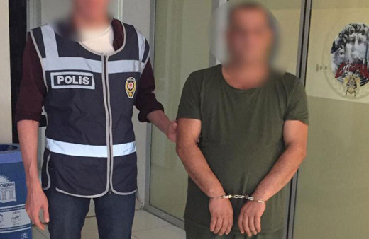 Aydın'da uzaklaştırma kararı olan koca tabancayla eve girerken yakalandı