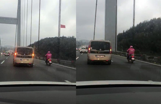 Köprüden geçen kuryeye otomobil sürücüsü kalkan oldu