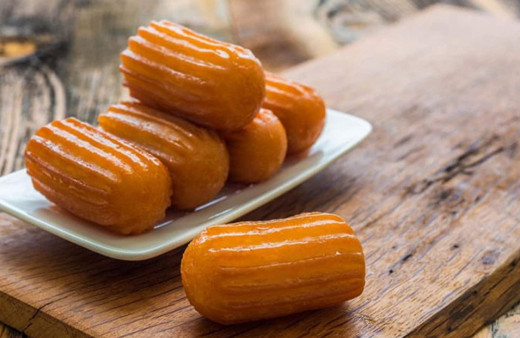 Şerbetli tatlıların vazgeçilmezi tulumba tatlısının bu tarifi parmaklarınızı yedirtecek!