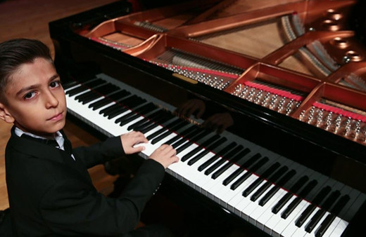 11 yaşındaki Aytekin Yılgın Uluslararası Mozart Yarışması'nda birincilik kazandı