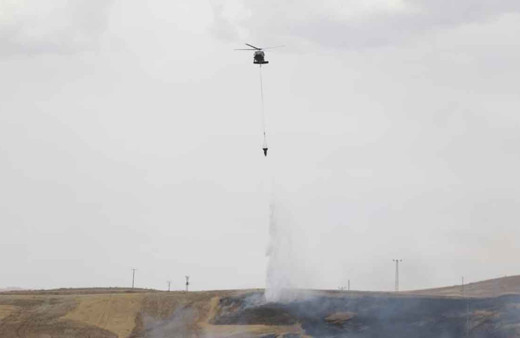 Diyarbakır'daki arazi kavgasında silahlar konuştu! Tarlada çıkan yangında helikopter destekli müdahale