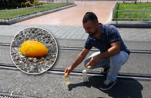 Türkiye resmen kavruluyor! İstanbul'un göbeğinde ilginç görüntüler: Asfaltta yumurta pişirip ekmek banarak yedi!