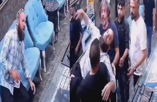 İzmir'de bir esnaf arıyı kurtarmak isterken az kalsın canından oluyordu