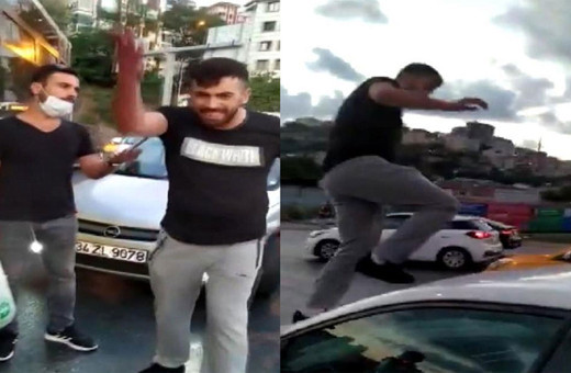 Trafi̇kte maganda kadın sürücüye ve aracına saldırdı