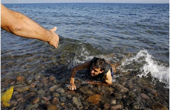 Dünyanın seyrettiği insanlık utancı! - Resim: 3