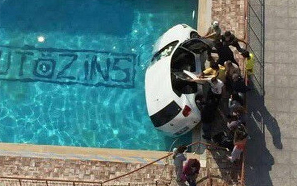 Akılalmaz kaza: Otomobil site havuzuna uçtu! - Resim: 2