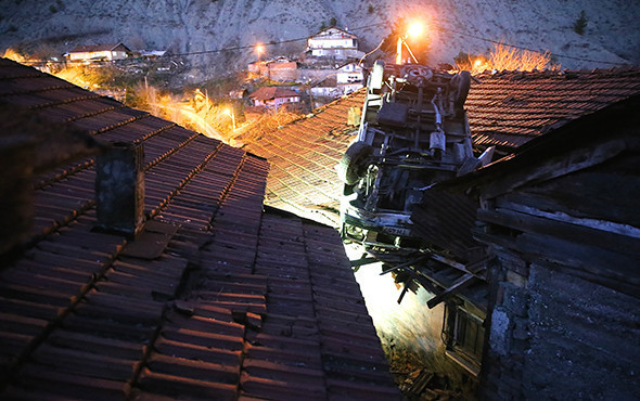 80 metrelik uçurumdan evin çatısına düştü! - Resim: 1