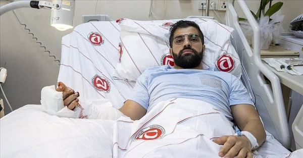 Eli ve belinden bıçaklanmıştı! Sağlık Bakanı Fahrettin Koca ziyaret etti - Resim: 0