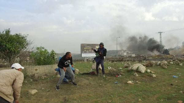 Bir anda yere yığıldı! İsrail askeri gazeteciyi böyle vurdu - Resim: 4