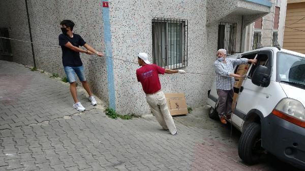 Şişli'de askıda kalan minibüsü halatla tuttular - Resim: 2