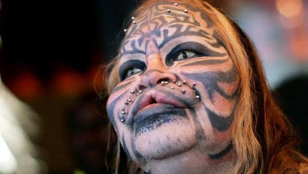 Ameliyatla kendini kaplana benzetti - Resim: 4