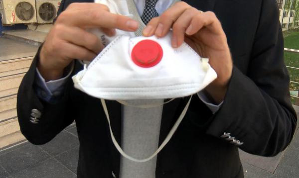 Filtresiz valfli maskeler için uyarı: Tehlike saçıyor - Resim: 0