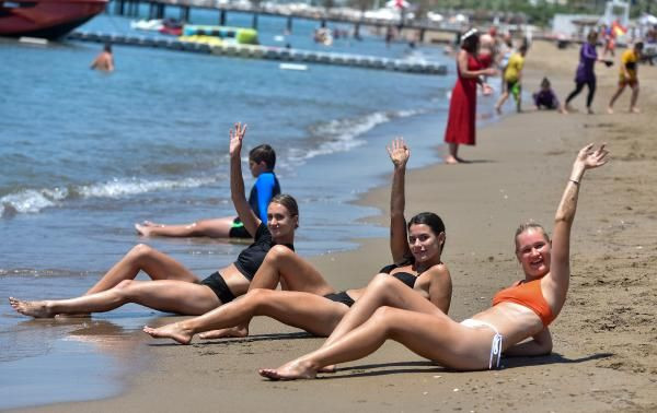 Antalya'da Rus turistler plajlara akın etti! Denizin keyfini çıkardılar - Resim: 4