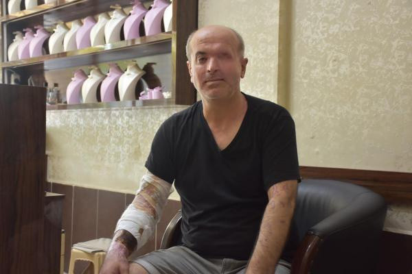 İzmir'de dükkanda otururken neye uğradığını şaşırdı: Kıyafetlerini çıkarıp çöpe atmış - Resim: 0