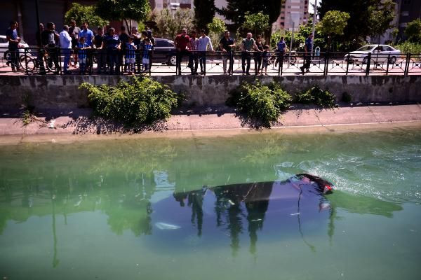 Adana'da otomobil sulama kanalına uçtu - Resim: 1