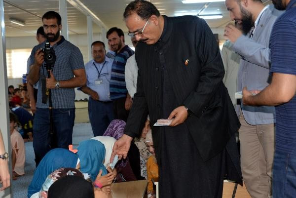 Yabancı senatör Kahramanmaraş'ta desteyle para dağıttı - Resim: 4