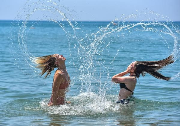 Antalya'da Rus turistler plajlara akın etti! Denizin keyfini çıkardılar - Resim: 2