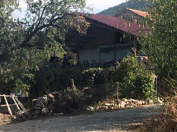 Isparta’da boşandığı kocasını öldürüp, ikiye böldüğü cesedini yaktı - Resim: 0