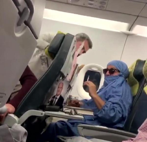 Uçakta “FETÖ'cüyüm, uçağı patlatacağım” diyen kadının oğlu bakın kim çıktı - Resim: 1