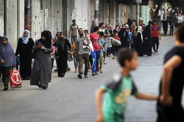 Bomba yağmuruna tutulan Şecaiye'den Filistinliler kaçıyor - Resim: 2