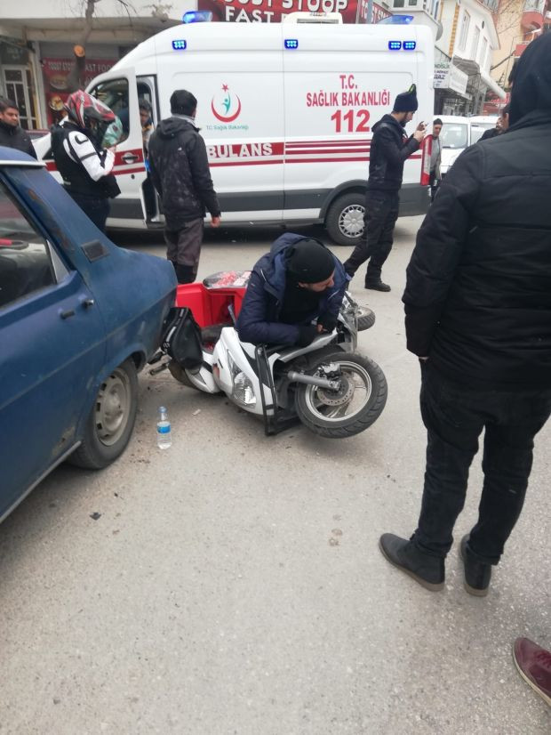 Isparta'da akılalmaz görüntü: Motosiklette sıkıştı! - Resim: 0