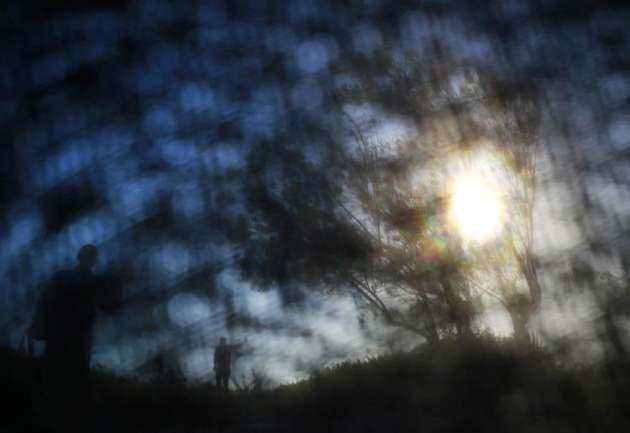 Çarşafın arkasından objektife takılan kareler - Resim: 1