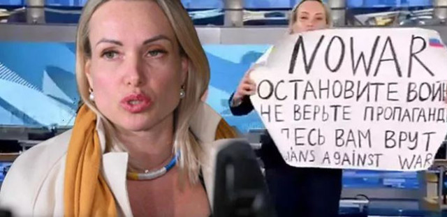 Savaşın sembol ismi Rus gazeteci polisler tarafından yakalanıp gözaltına alındı - Resim: 0