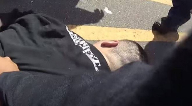 ABD'de polis skandala imza attı! Kafası sıcak asfalta bastırılan hırsız öldü - Resim: 0