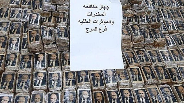 Libya sahillerine yüzlerce uyuşturucu paketi vurdu! Hepsinin üstünde Putin'in fotoğrafı var - Resim: 0