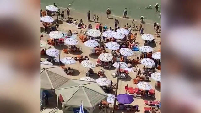 Nüfusunun tamamını aşılayan İsrail'de maske zorunluluğu kalktı plajlar doldu taştı - Resim: 0
