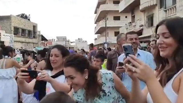 Suriye'de festival keyfi... Humus'tan dikkat çeken görüntüler - Resim: 1