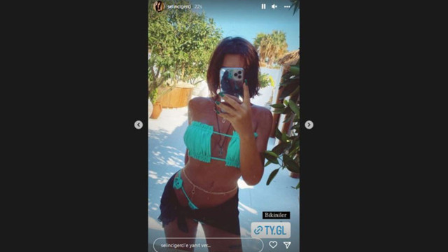 Selin Ciğerci'den, Gökhan Çıra'yı koşa koşa döndürecek pozlar! Mavi bikinisiyle şovunu yaptı - Resim: 1