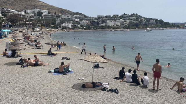 Muğla'da oy kullanan seçmenler güneşli havayı fırsat bilerek sahillere akın etti - Resim: 2