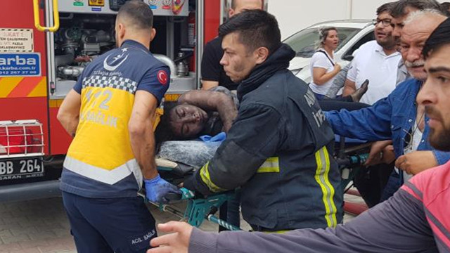 Yangında mahsur kalan genç kızın içler acısı hali tüm vücudu kararmış! Onu kurtaran İtfaiye eri fenalaştı - Resim: 0