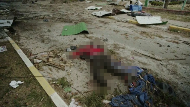 Rusya'nın 'ateşkes' amacı farklı! Ruslardan kurtarılan kenlerde sokaklar çürümüş ceset dolu - Resim: 3