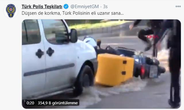 Göle dönen yolda suya düşen kuryenin yardımına polisler yetişti - Resim: 0