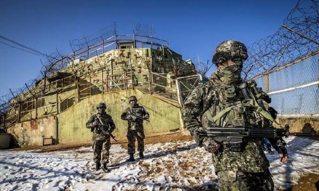 Kuzey Kore lideri Kim Joung-un ortaya çıktı Güney Kore'ye roket attı - Resim: 0