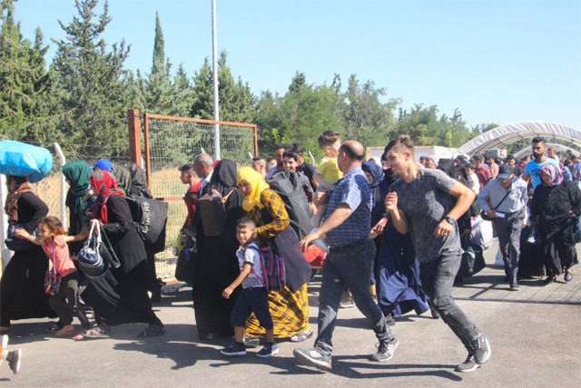 Suriyeliler ülkelerine koşarak gitti - Resim: 1