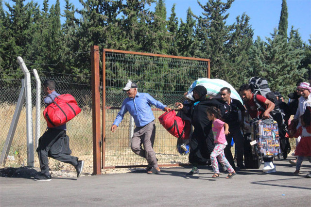 Suriyeliler ülkelerine koşarak gitti - Resim: 0