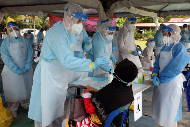 Malezya'da koronavirüs aşısının dinen uygun olduğu fetvası verildi - Resim: 0